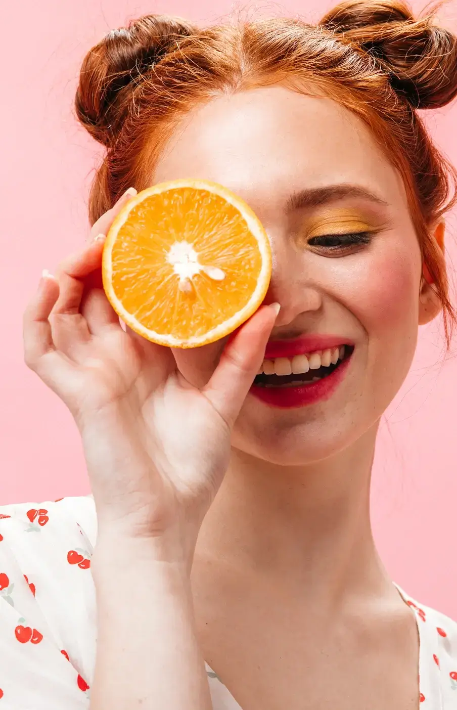 Girl with an orange instead of an eye